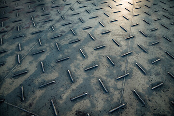Texture of metal Diamond plate steel floor of ferry with diamond pattern. Old metal floor...