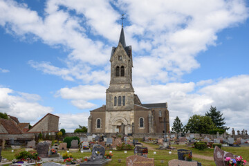 Fototapeta na wymiar Church of Saint-Alban view from cemetery in Lormes in Morvan Regional Natural Park in the region Bourgogne (Burgundy).
