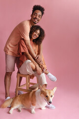 High quality full frame African man and woman in studio. Family portrait of newlyweds on honeymoon...