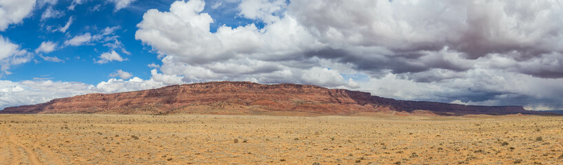 Fototapeta na wymiar A panorama of the Vermillion Cliffs National Monument in the desert of northern Arizona on a bright, spring day.