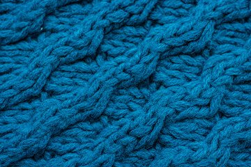 Blue background with large knitted thread pattern