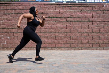 Side View On Confident Nice Obese Woman In Sportive Clothes Jogging, Running Forward, Training In...