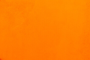 orange neon paint at a wall