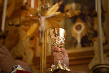 Consecration of bread and wafer wine