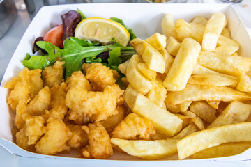 Scottish Pittenweem prawns deep fried in batter with French fries