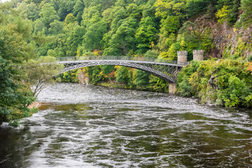 Fototapeta premium Craigellachie Bridge across the River Spey at Craigellachie, Scotland.