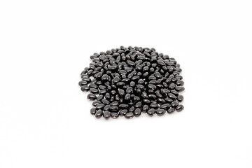 Black beans isolated in a white background. 