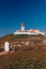 Fototapeta na wymiar Cabo da Roca lighthouse and Rotary Monument in Portugal.