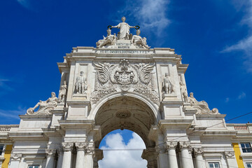 Fototapeta na wymiar Rua Augusta Triumphal Arch, which gives access to the Baixa neighborhood in Lisbon (Portugal)