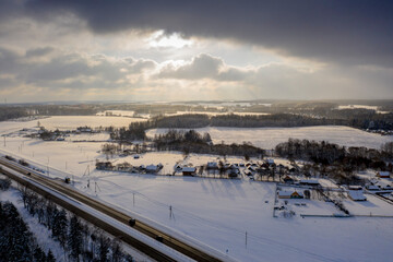 Obraz premium Aerial view of agricultural landscape at sunset