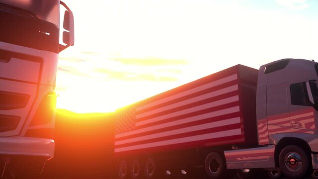 Semi-trailer trucks load or unload at warehouse bays with flag of the USA. American logistics concept
