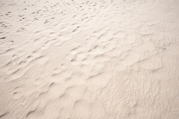 Detail of texture sand in tropical island Summer background and travel design