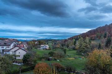 Fototapeta premium View of a typical Swiss countryside with cloudy sky