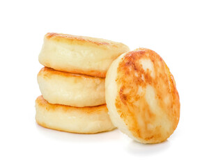 Tasty cottage cheese pancakes on white background