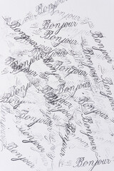 rubber stamp background with the french word "bonjour" 