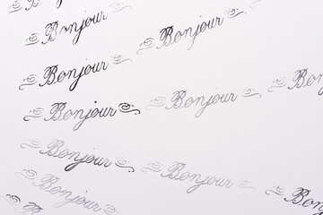 rubber stamp background with the french word "bonjour" 
