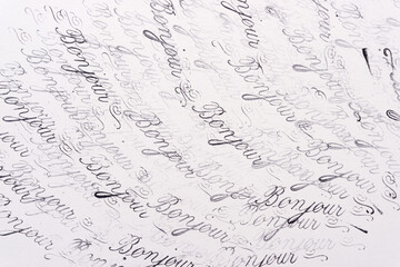 rubber stamp background with the french word bonjour © eugen