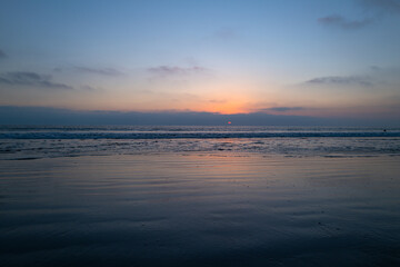 Panoramic view of sunset over ocean. Beautiful serene scene. Sea sky concept, sunrise colors clouds. Nature landscape, scenery beach. Summer vacation background.
