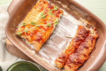 Delicious casserole with minced meat in baking dish on table