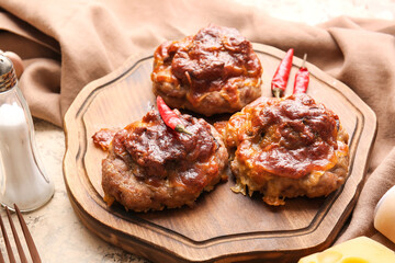 Wooden board with delicious minced meat boats on table