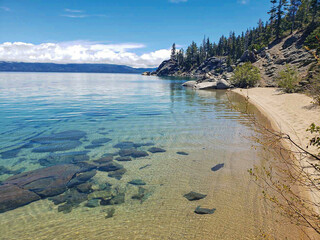 Crystal clear water in mountain lake Tahoe 