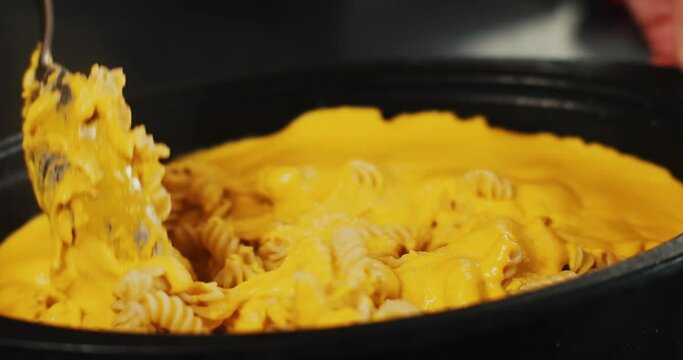 Closeup of homemade mac and cheese being prepared.