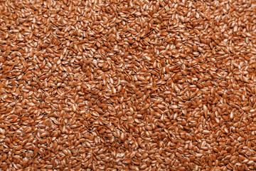 Flax seeds as background, closeup