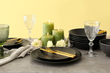 Stylish table setting on color background