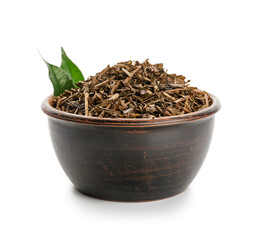 Bowl of dry hojicha green tea on white background