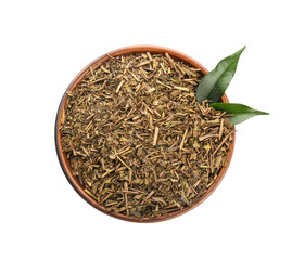 Plate with dry hojicha green tea on white background