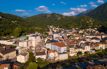 Fototapeta premium Picturesque summer mountain landscape with small French town of Ax-les-Thermes, Ariege department