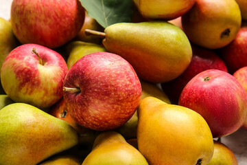 Ripe pears and apples as background
