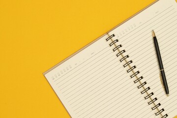 Notebooks and pens are ready to work.