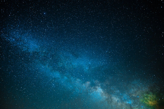The majestic night sky. Milky Way. Twinkling stars. Minimalism. Abstraction. There are no people in the photo. There is a place to insert. Astronomy, astrology, space, the universe.