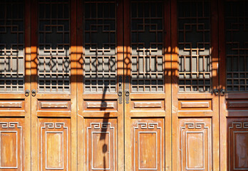  Foshan city, China. Xi Qiao Mountain Guoyi Movie and TV City.  The street  depicting Guangzhou street in real size in the early 20th century. Traditional wooden doors. 