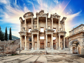 Facade of antique library of Celsus in Ephesus under dramatic sky