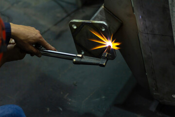 Construction workers working without protective equipment can be dangerous. Workers cutting steel...