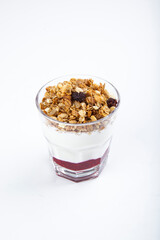 dessert granola on white plate from above