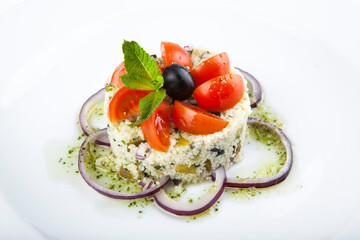appetizer with porridge tomatoes onions olives
