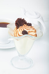delicious sweet dessert on white plate with tea