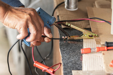 electrician working in a power supply