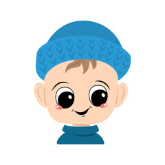 Avatar of a child with big eyes and a wide smile in a blue knitted hat. A cute kid with a joyful face in an autumnal or winter headdress. Head of adorable toddler with happy emotions