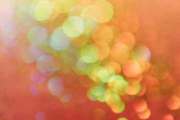 Obraz premium Abstract sequin background with shining festive bokeh.