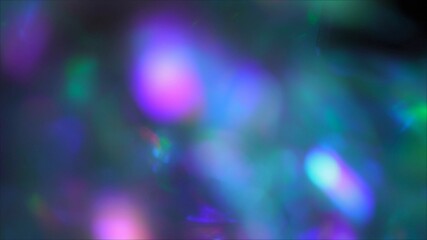 Purple blue green colors rays and glow. Prism crystal light hologram rainbow Christmas blurry...