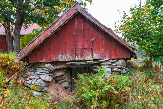 Red old root cellar at the country