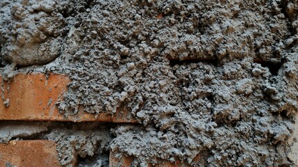 Dark gray concrete wall texture and bricks for background