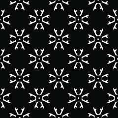 Flower geometric pattern. Seamless vector background. White and black ornament. Ornament for fabric, wallpaper, packaging. Decorative print