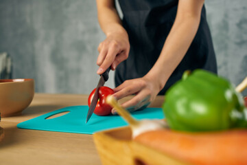 Cook in black apron Cooking healthy eating cutting board