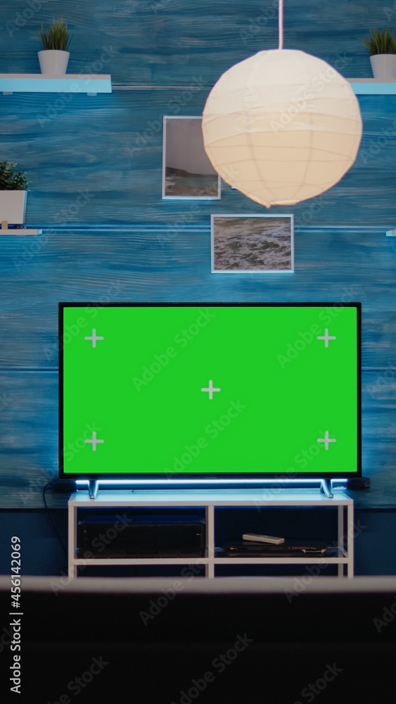 Poster empty modern room designed with green screen on tv at home. nobody in area with digital technology a