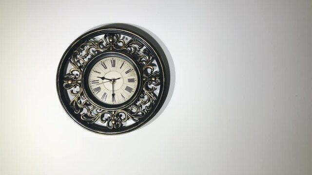 Old Dark Antique Wall Clock with Roman Numerals